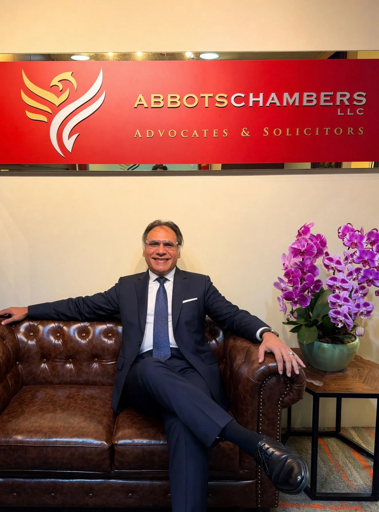 Gino Hardial Singh, founder of Abbots Chambers LLC, in formal legal attire